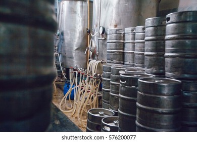 Metal Beer Kegs Stand In Beer Plant. Brewery.