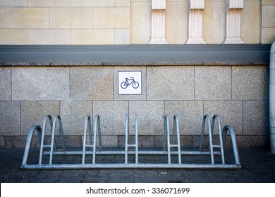 Metal Bike Rack By The Tiled Wall