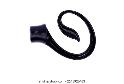 Metal Black Tip For Curtain Poles On A White Background.Ending For Drapery Rod.Finials For Curtain Cornices.curtain Poles In Form Of Curl .Close-up With Details.macro Shoot.top View, Flat Lay     