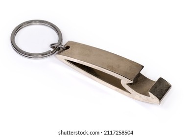 Metal Bottle Opener In The Form Of A Keychain With Attached Steel Split Ring Close-up On A White Background
