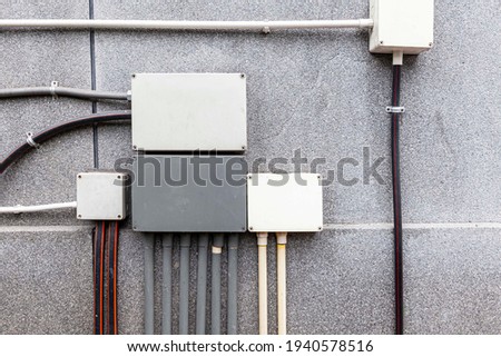 Metal box of Network electric cable at building wall