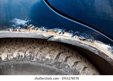 Metal of car arch above the wheel rots and collapses - Shutterstock ID 1951178578