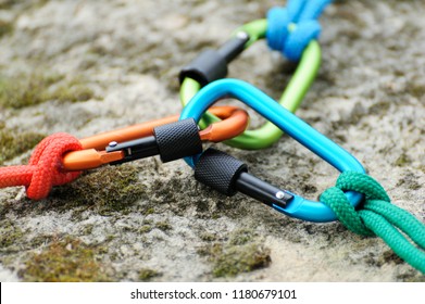 Metal carabine for mountaineering. Photo of colored carabines.  Climbing concept   