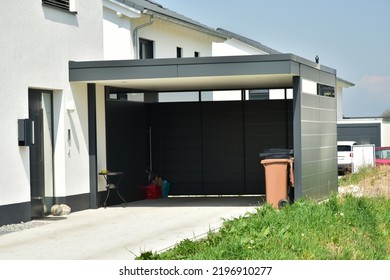 Metal Carport In Front Of A Residential Building