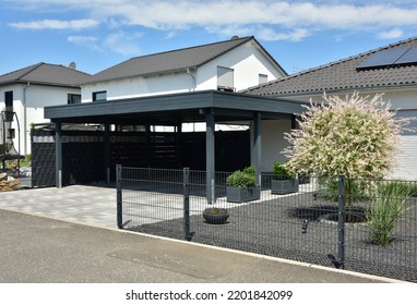 Metal Carport in Front of a residential Building - Shutterstock ID 2201842099