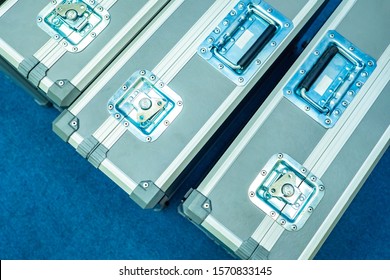 Metal cases. Steel cases top view. Cases for musical equipment. Transportation of equipment. Protection of musical instruments during transportation. Concept - Accessories for aluminum boxes