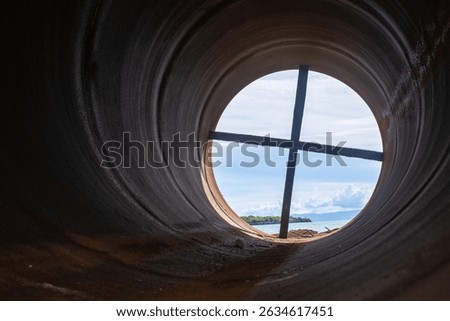 metal casing pipes of large diameter, stacked.  They are used in bridge construction, in particular, for drilling piles in difficult geological conditions, including underwater drilling