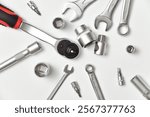 Metal chrome horn and socket wrenches with adapters, bits, wrenches and ratchet for repairs