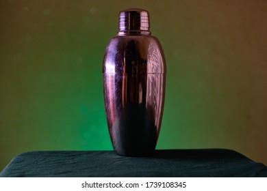Metal Coctail Shaker On Green Background
