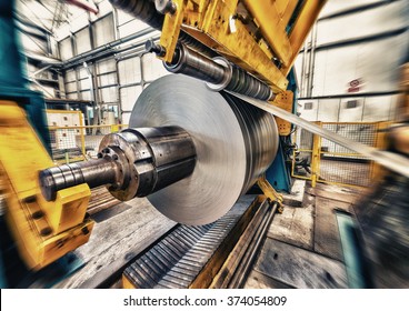 Metal coils machine. Interior of factory. Business concept. - Shutterstock ID 374054809