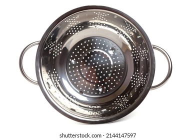metal colander with polished metal handles top view on a white background
