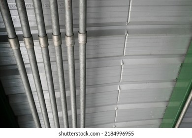 Metal Conduit Pipe On The Roof.