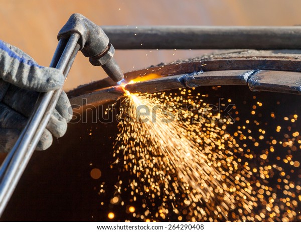 Metal cutting with an acetylene torch