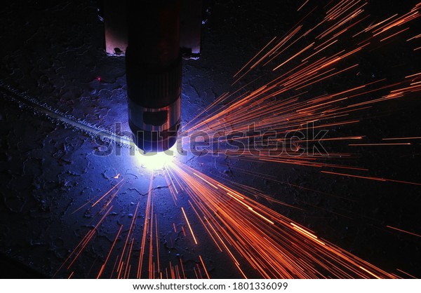 metal cutting process using plasma cutting\
machine. Industry