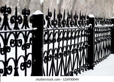 Metal Decorative Fence In The Snow