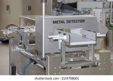 Metal Detector Machine At Conveyor Belt Food Production Factory Safety