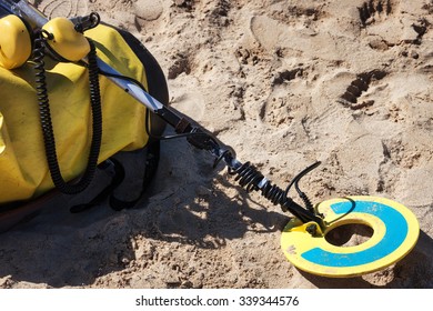 Metal Detector On The Sandy Beach