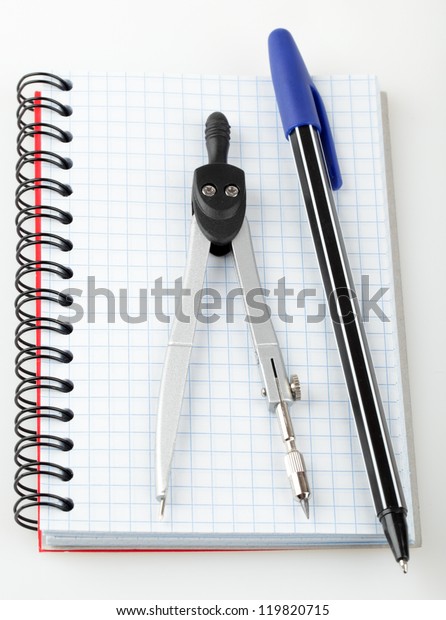 Metal\
dividers, pen and notebook on white\
background