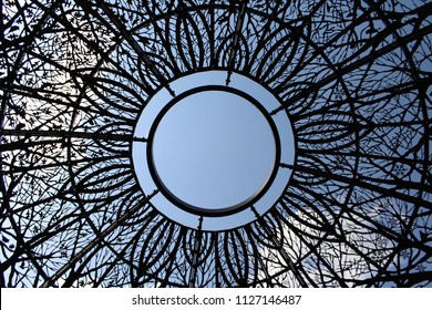 Metal Dome design from a gazebo with a blue sky background - Sunken Gardens Lincoln, Nebraska