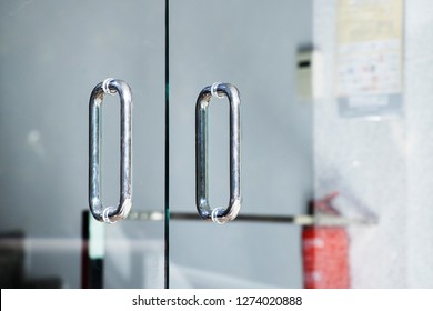 Metal Door Handle. Door Handle On The Glass Door. Glass Doors. Style. Modern Interior. Entrance. Office. Office Building.