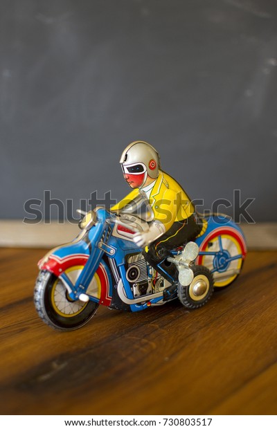 Metal an driving\
motorcycle toy, retro