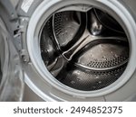 Metal drum inside a washer and dryer