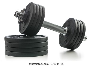The metal dumbbell and weights isolated on white background.