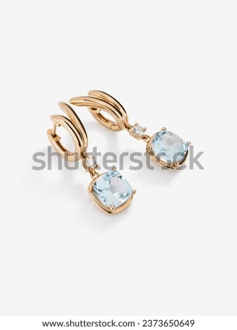 Metal Earring with Topaz and Diamonds stone including clipping path 