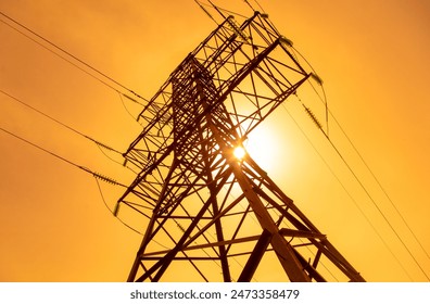 Metal electric pole against the backdrop of the sunset. - Powered by Shutterstock