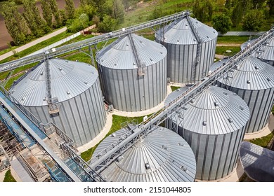 Metal elevator (grain silo) in agriculture zone. Grain Warehouse or depository is an important part of harvesting. Сorn, wheat and other crops are stored in it. Top view