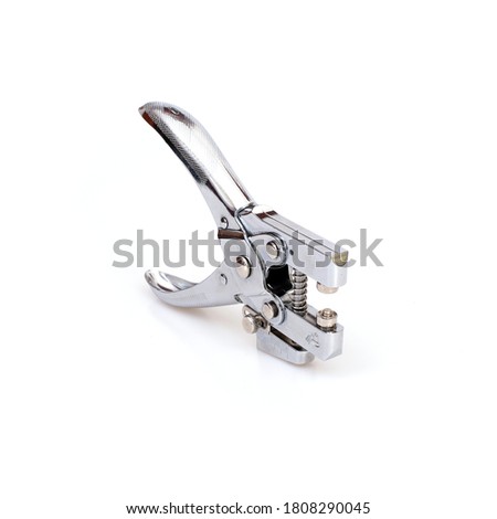 Metal eyelet setting tool isolated on white background