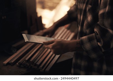 Metal, factory and hands of person with tablet for quality control, process management and monitor production. Foundry workshop, worker and online for technical documentation and inventory tracking. - Powered by Shutterstock