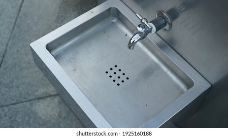 Metal Faucet For Drin Water In A Public Winter Park