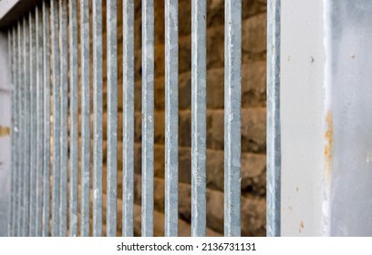 Metal Fence And Bluestone Wall Background