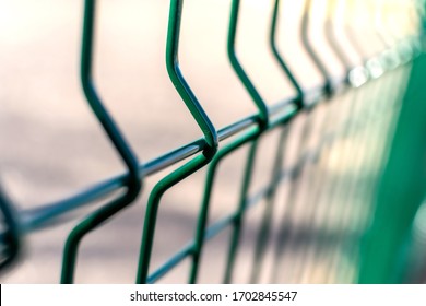 Metal Fence Close-up. Territory Fencing, Green Fence.