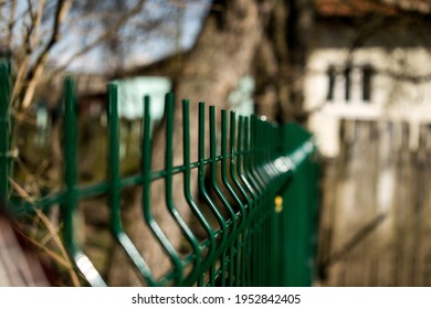 Metal Fence At The Farm. Fencing A Plot Of Land.