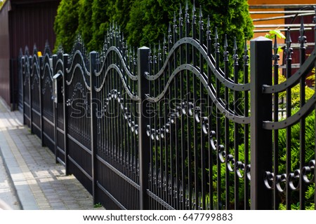 Metal Fence. Modern iron wall.