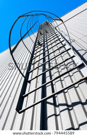 Similar – Basketball hoop from the frog’s perspective in front of a blue sky