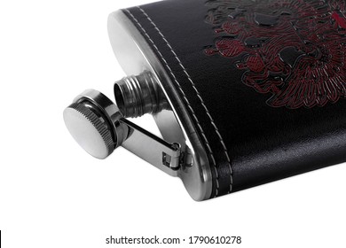 Metal flask in a leather case with a pattern depicting a doubleheaded eagle on a white background