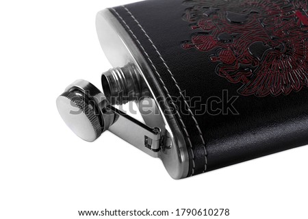 Metal flask in a leather case with a pattern depicting a doubleheaded eagle on a white background
