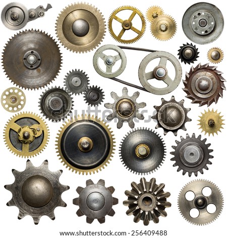 Metal gear, cogwheels, pulleys and clockwork spare parts. 