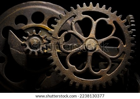 Metal gear sprockets in machine, old and rusted closeup still life with beautiful textures, shape and detail. Fine art