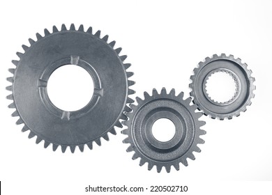 Metal gears on plain background - Powered by Shutterstock