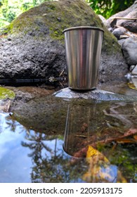 Metal Glass Reflection In The River Of Nature