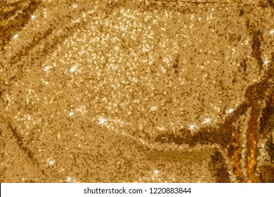 Metal Glitter Gold Cloth Background, Close Up. Trendy Metallic Golden Fabric Texture. Fortuna Gold Color Trend 2021 Year. Golden Sequins, Sparkling Sequined Textile. 