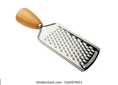 Metal grater with a wooden handle on a white background. Isolated object
