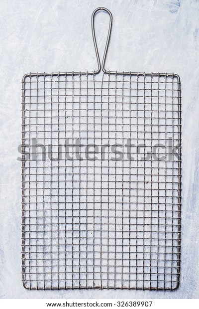 metal\
grid or rack for baking and cooling baked cakes\

