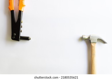 Metal Hammer With Wood Handle And Rivet Tool With Various Layouts Isolated On A White Background.