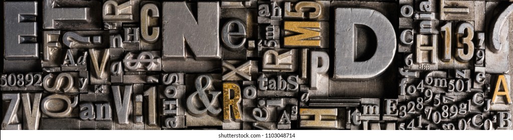 Metal Letterpress Types. 
A Background From Many Historical Typography Letters In Black And White With White Background.
