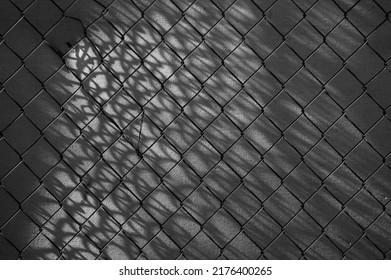 metal mesh,in the photo a mesh on a gray background.